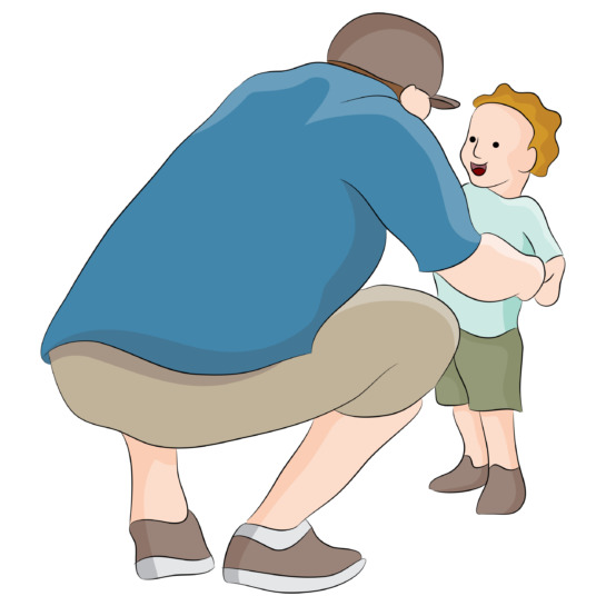 parent squatting down and talking to child